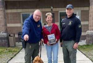 Gary Thoresen (from left), officer/K9 handler, Hamilton Township Police Department, Bev Greco, executive director, South Jersey Regional Animal Shelter, and Chris Robell, officer, Hamilton Township Police Department, and K9 officer Skye are pictured in front of the South Jersey Regional Animal Shelter.